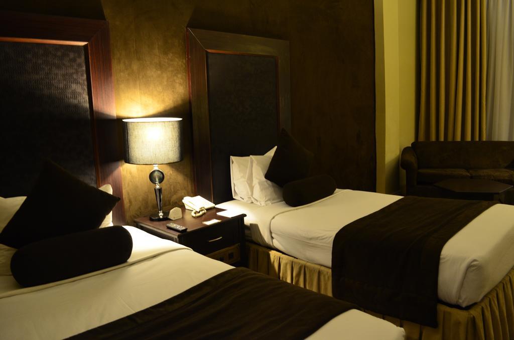 Smart Hotel Lahore Zimmer foto